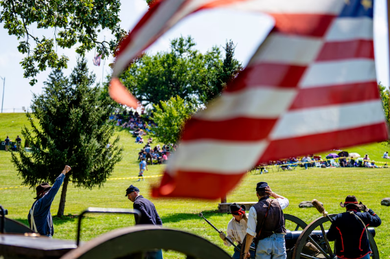 A group of re-enactors practices artillery demonstrations during the Civil War Muster in Cascades Falls Park in Jackson on Saturday, Aug. 24, 2024. The Civil War Muster is an annual festival that includes re-encactments from the civil